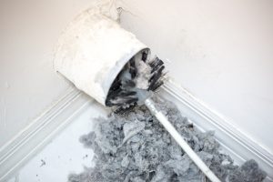 heavy dust buildup before dryer vent cleaning service